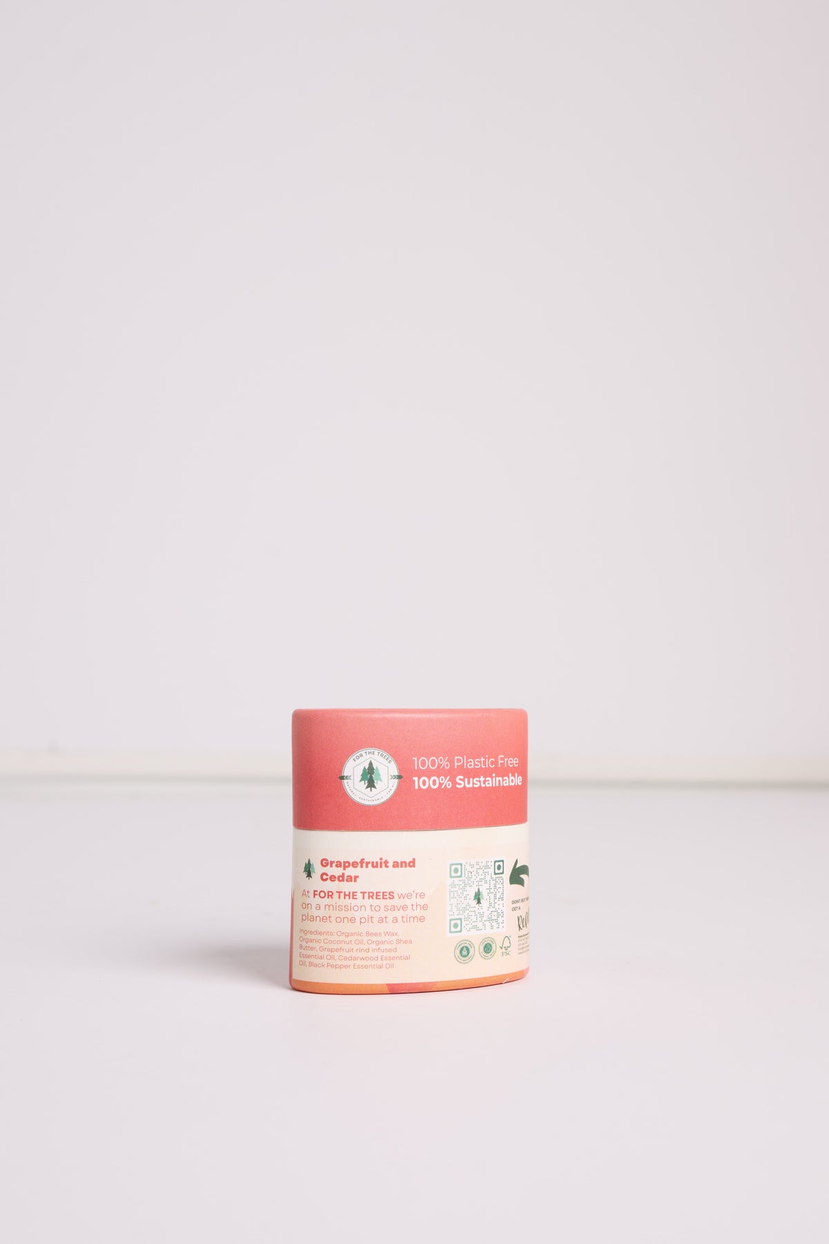 A Travel Size Grapefruit and Cedar All Natural Deodorant (rear label facing)