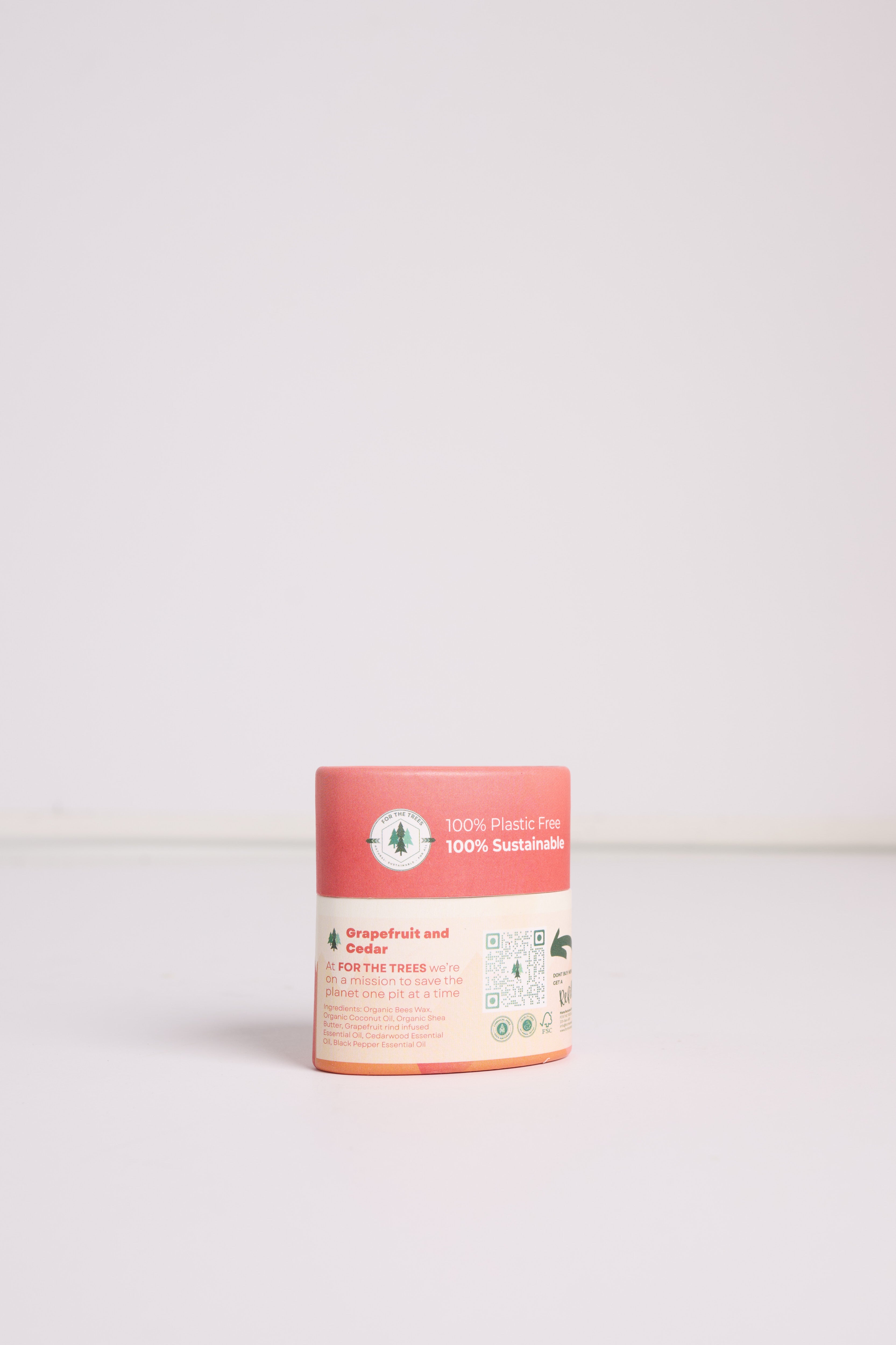 A Travel Size Grapefruit and Cedar All Natural Deodorant (rear label facing)